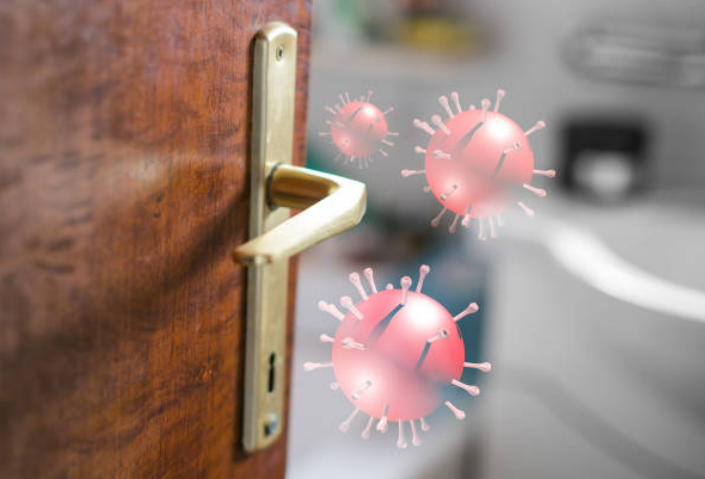 germs on a brass door handle